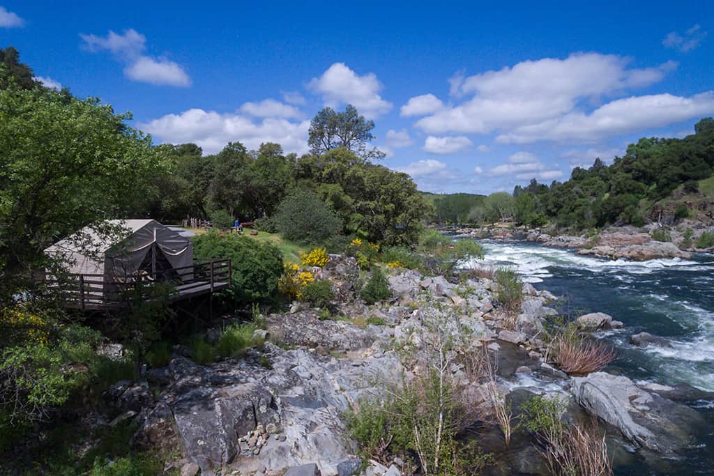 camping-landing-page-river-front-platform-cabin-tent